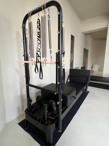 Tula Ropia 普拉提器械床：无缝设计，滑车顺畅。全伸缩绳索系统。适合所有普拉提水平的普拉提器械床，配有塔式梯桶。 